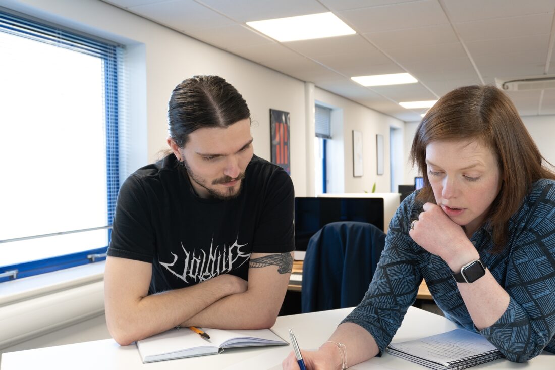 Luke and Judith reviewing work
