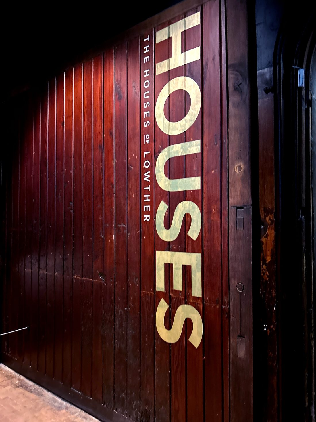 The story of Lowther exhibition, 'The Houses of Lowther' gold typographic wall vinyls