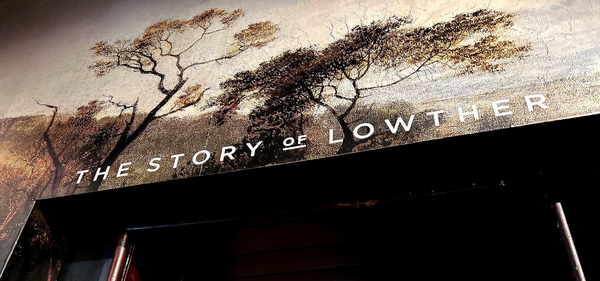 The Story of Lowther exhibition, Lowry painting wall wrap signage