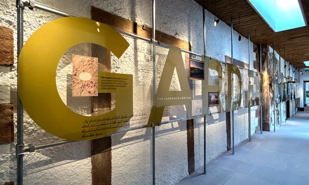 The Story of Lowther exhibition, clear acrylic exhibition signage for the Gardens of Lowther section