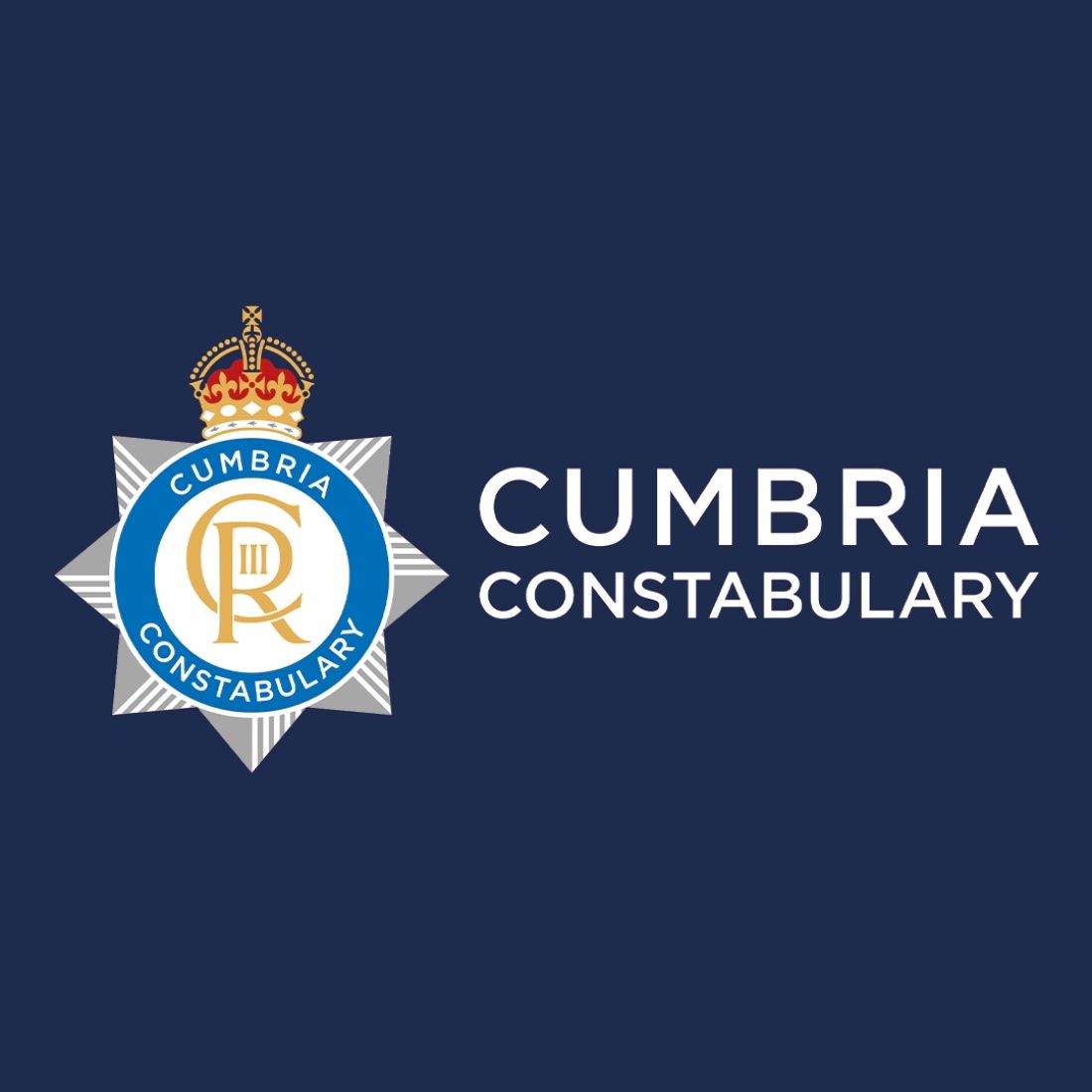 Cumbria Constabulary updated police crest featuring King Charles lll new cypher, on a dark blue background.