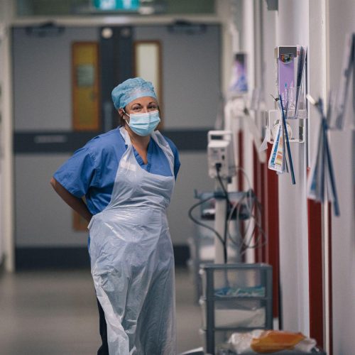 Hospital Nurse wearing PPE on Ward