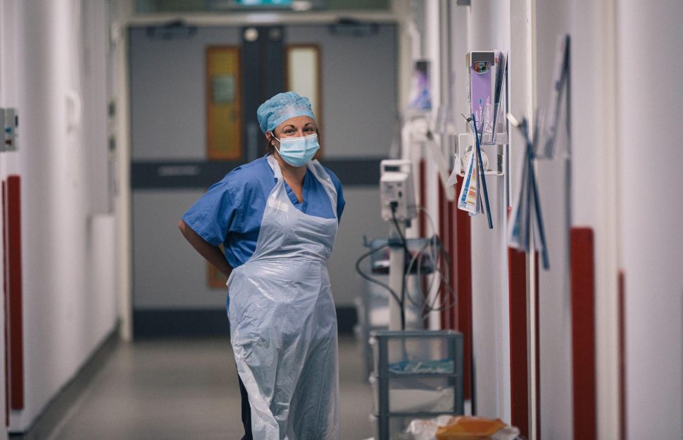 Hospital Nurse wearing PPE on Ward