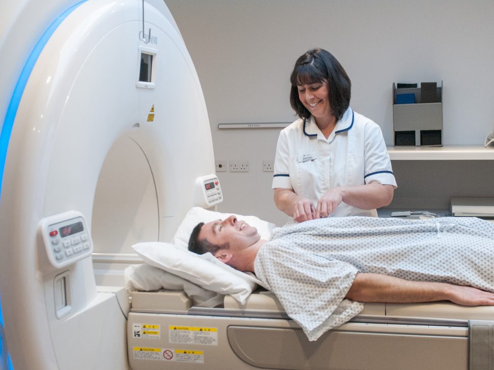 Staff and patient before MRI