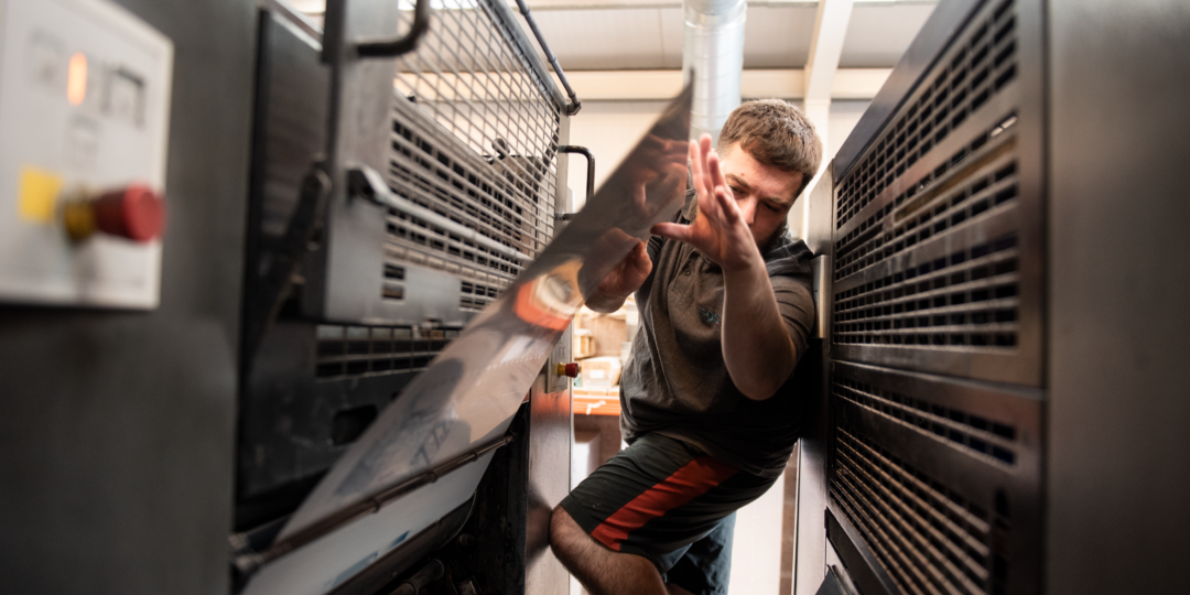 Reeds team working on the Litho printer in Penrith