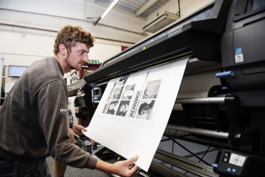 Andy printing a wide format banner