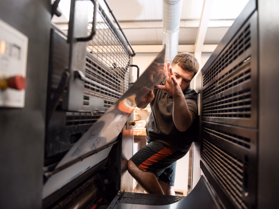 Reeds team working on the Litho printer in Penrith