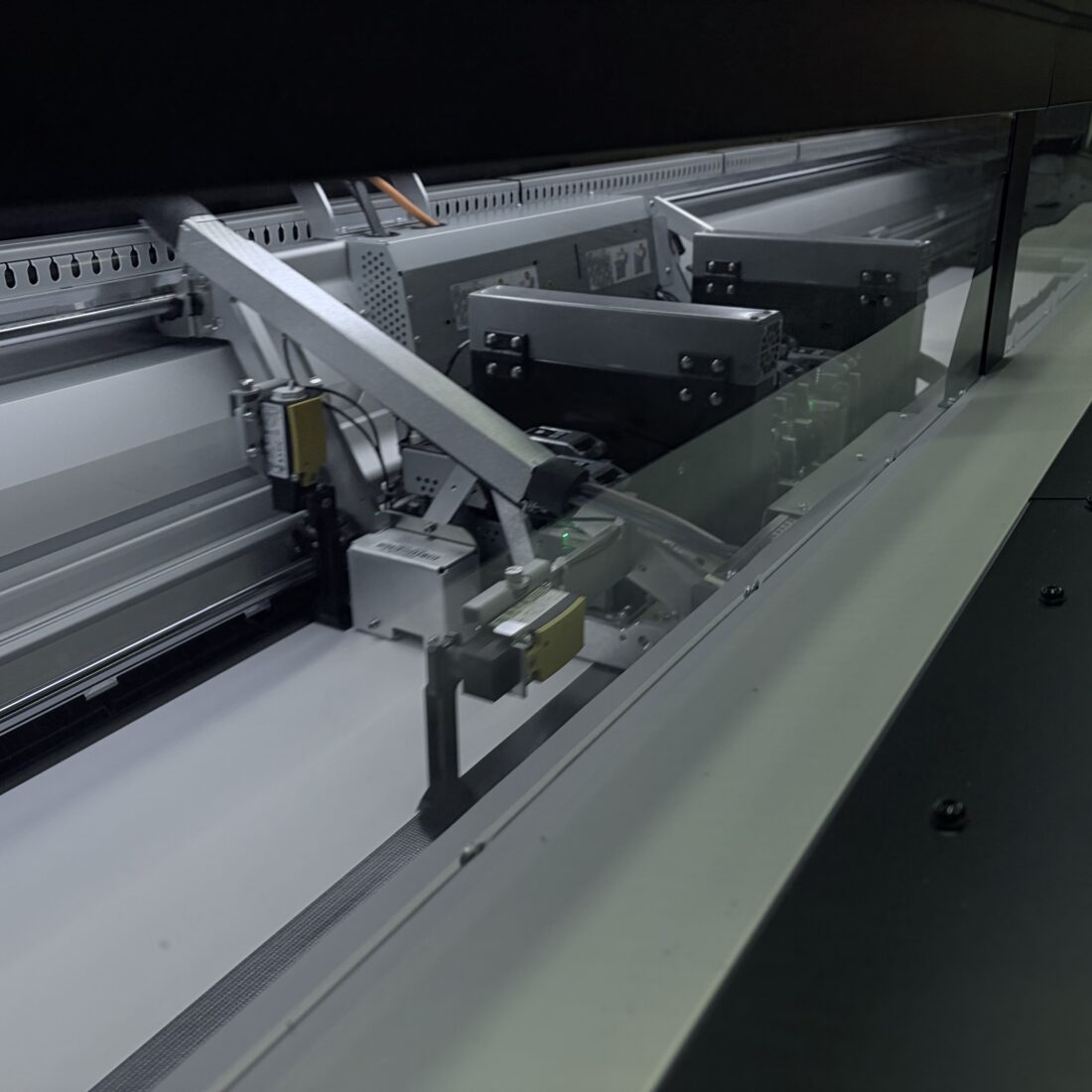 HP Latex R2000 wide-format printer producing a large-format print at Reeds