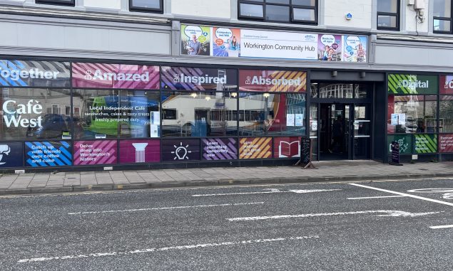 Workington community hub window graphics running along building's windows