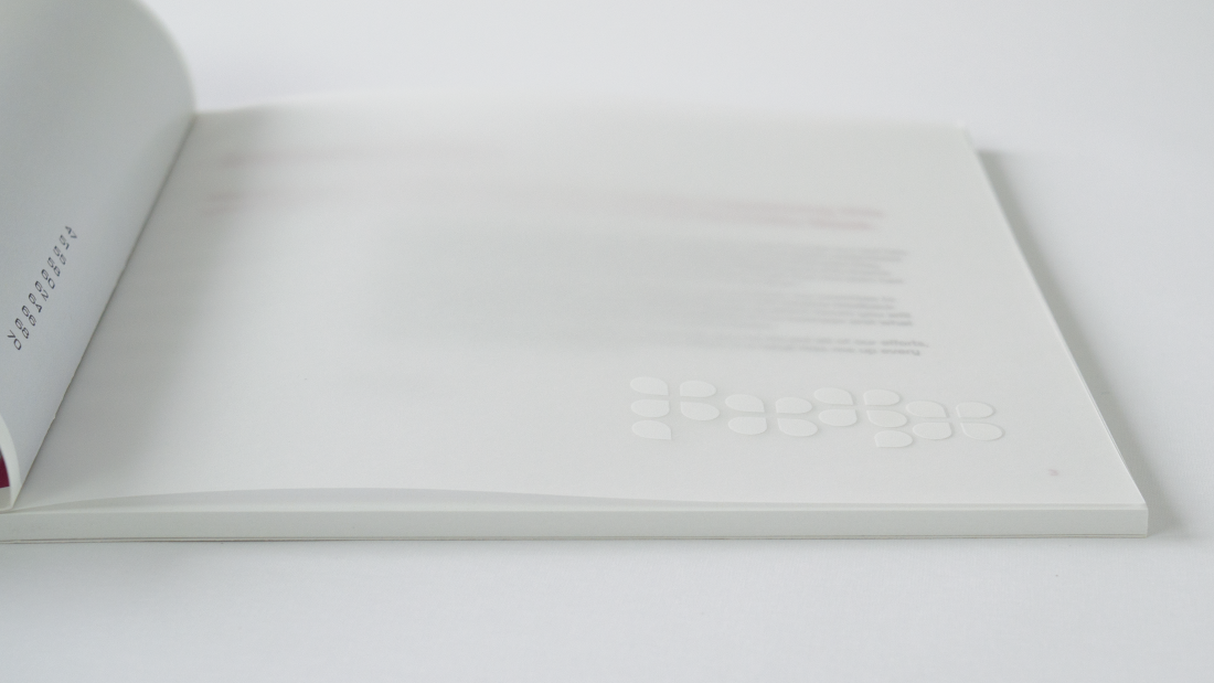 Brochure design, with simulator sheet with white ink shapes