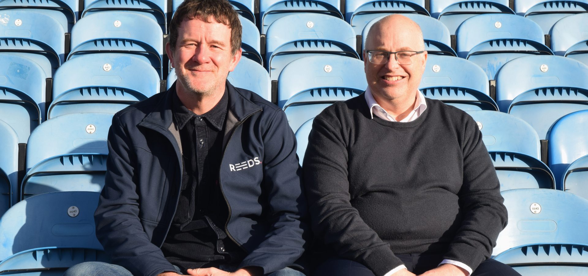 Jonathan Nagle (Reeds director) and Nigel Clibbens (Carlisle United FC CEO) sat at Brunton Park